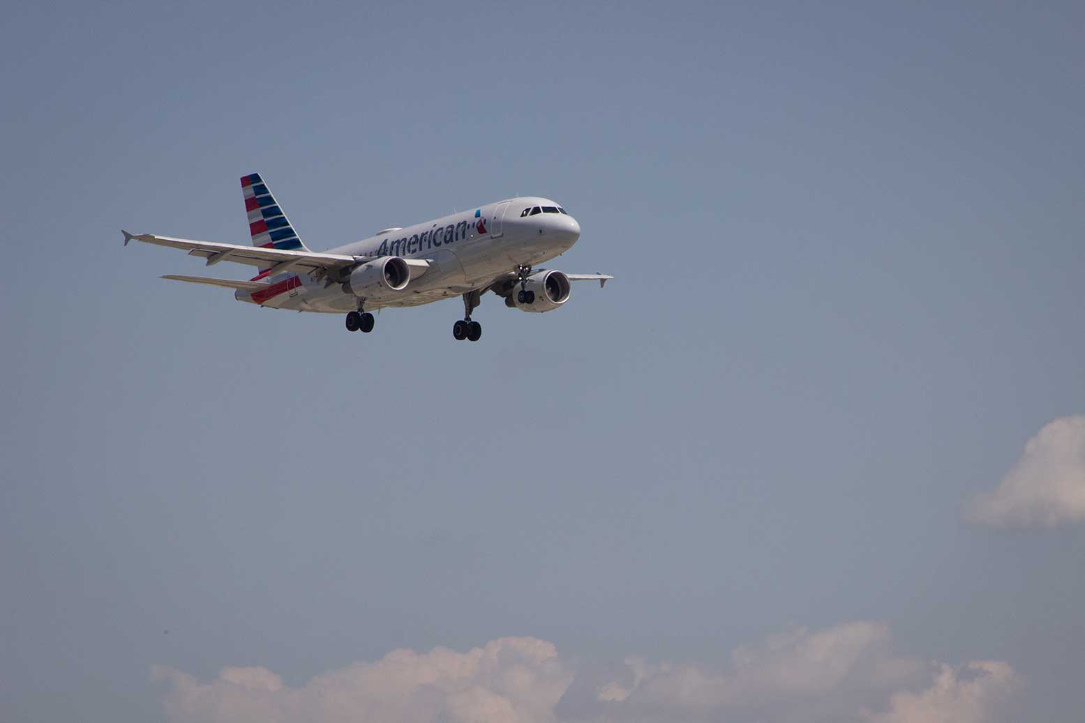 A plane landing at an airport