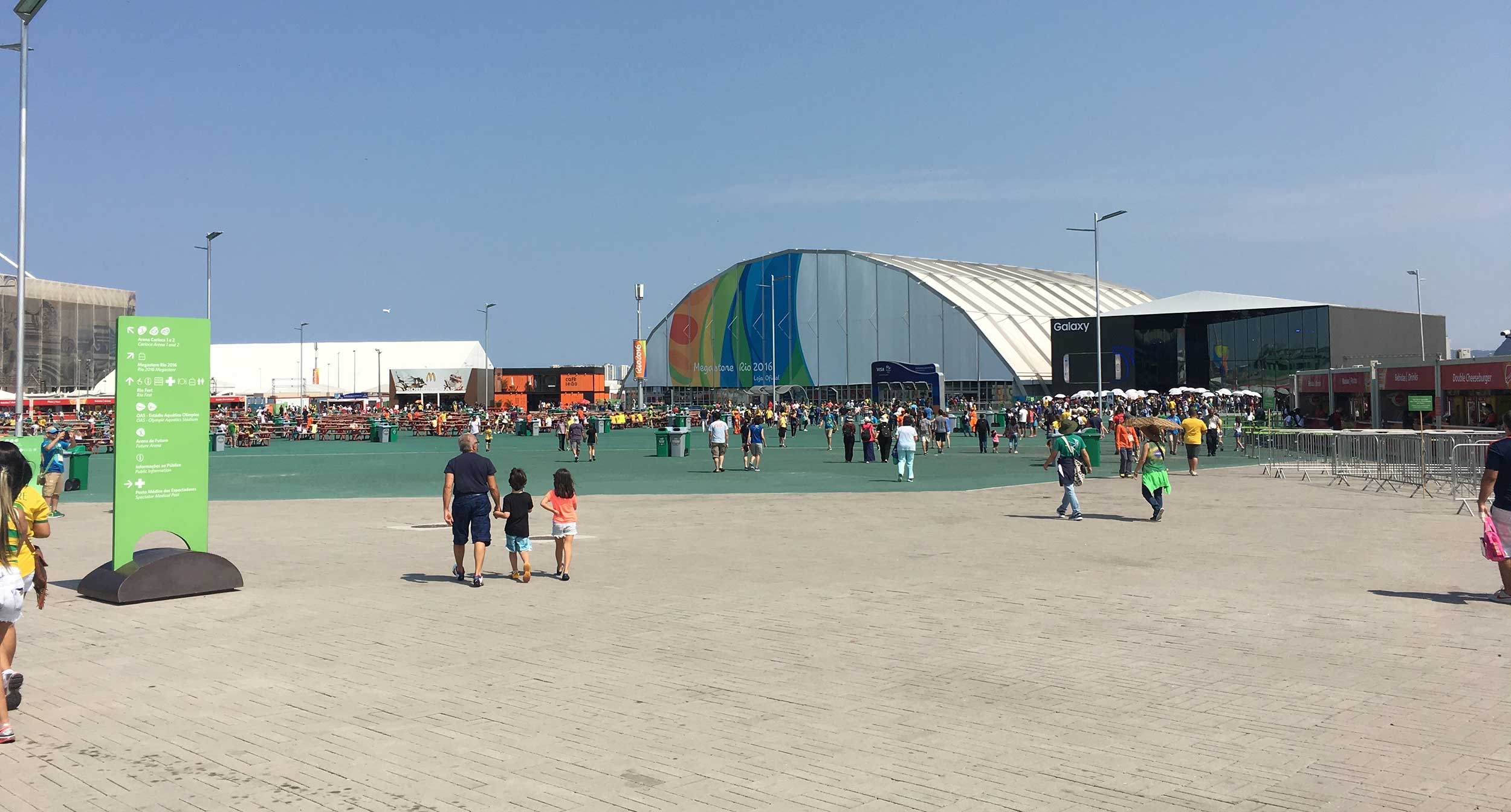 A flat plaza in the Olympic Park in Rio de Janeiro, Brazil, with the Olympic store in the background