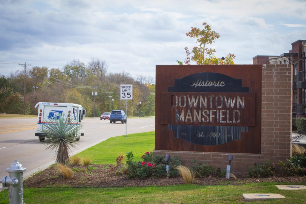 A photo of the welcome to Historic Downtown Mansfield sign