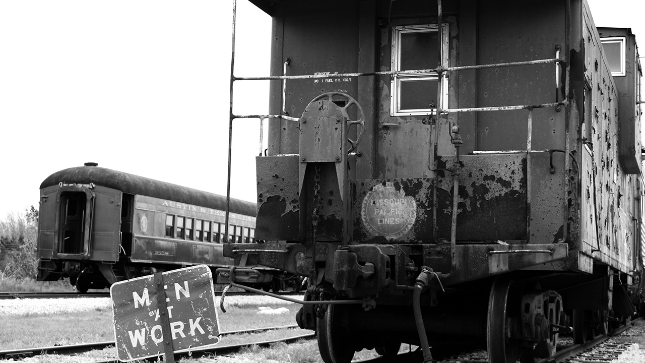black and white photo of a train caboose